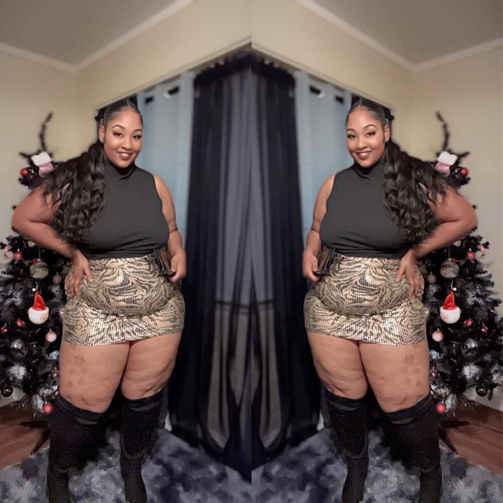 Chic Black Top with Animal Print Skirt